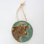 Cow sculpture medallion